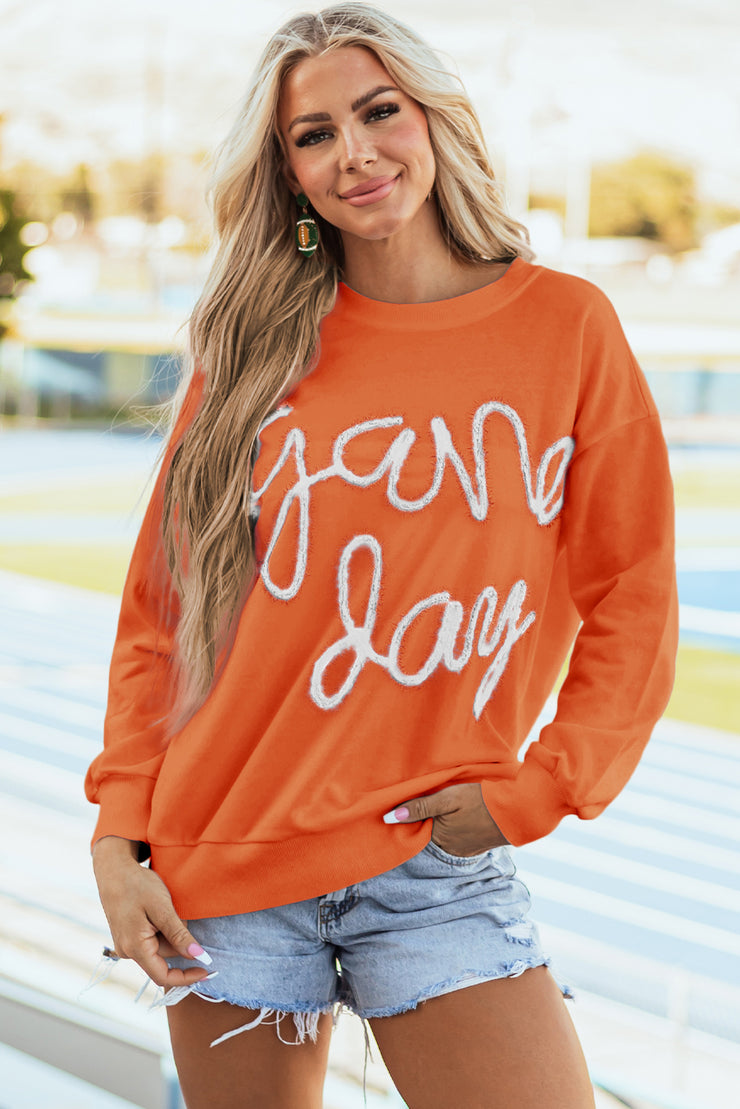 Russet Orange Tinsel Game Day Drop Shoulder Graphic Sweatshirt