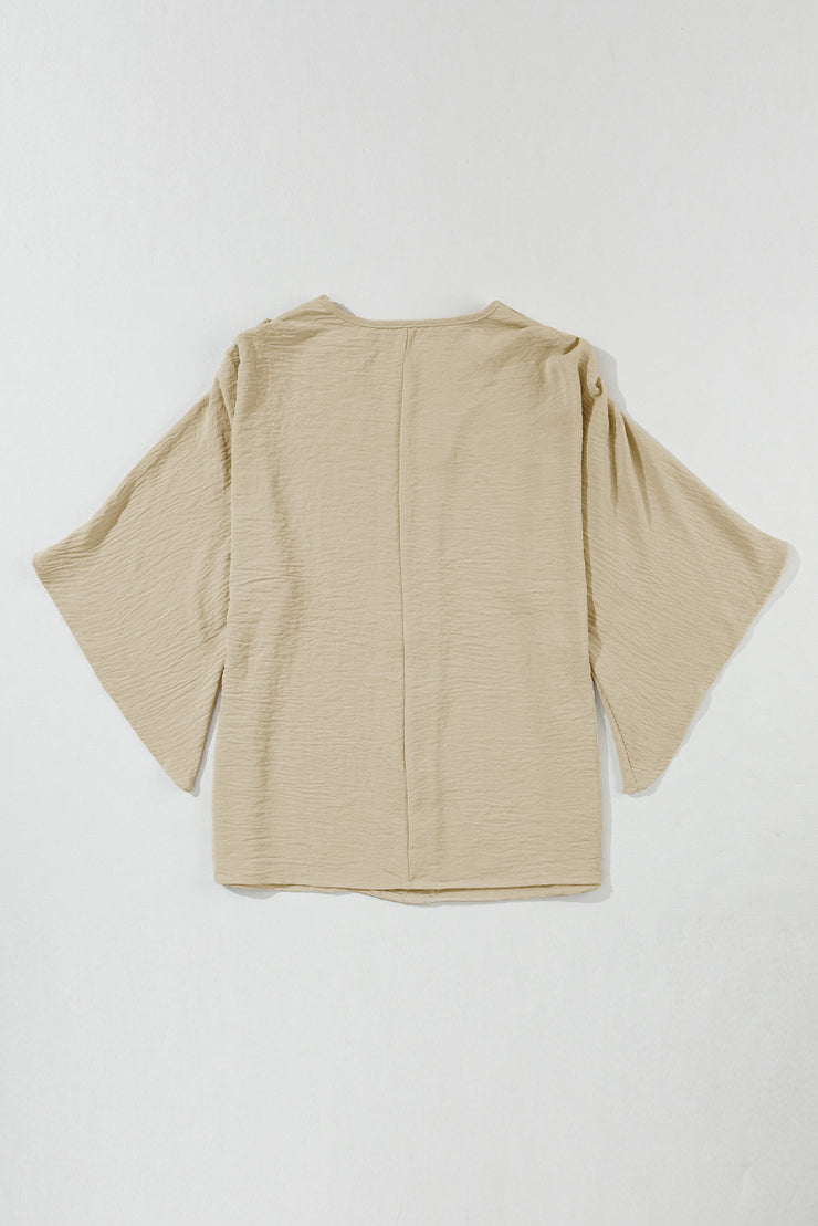 Parchment Solid V Neck Wide Sleeve Crinkled Blouse