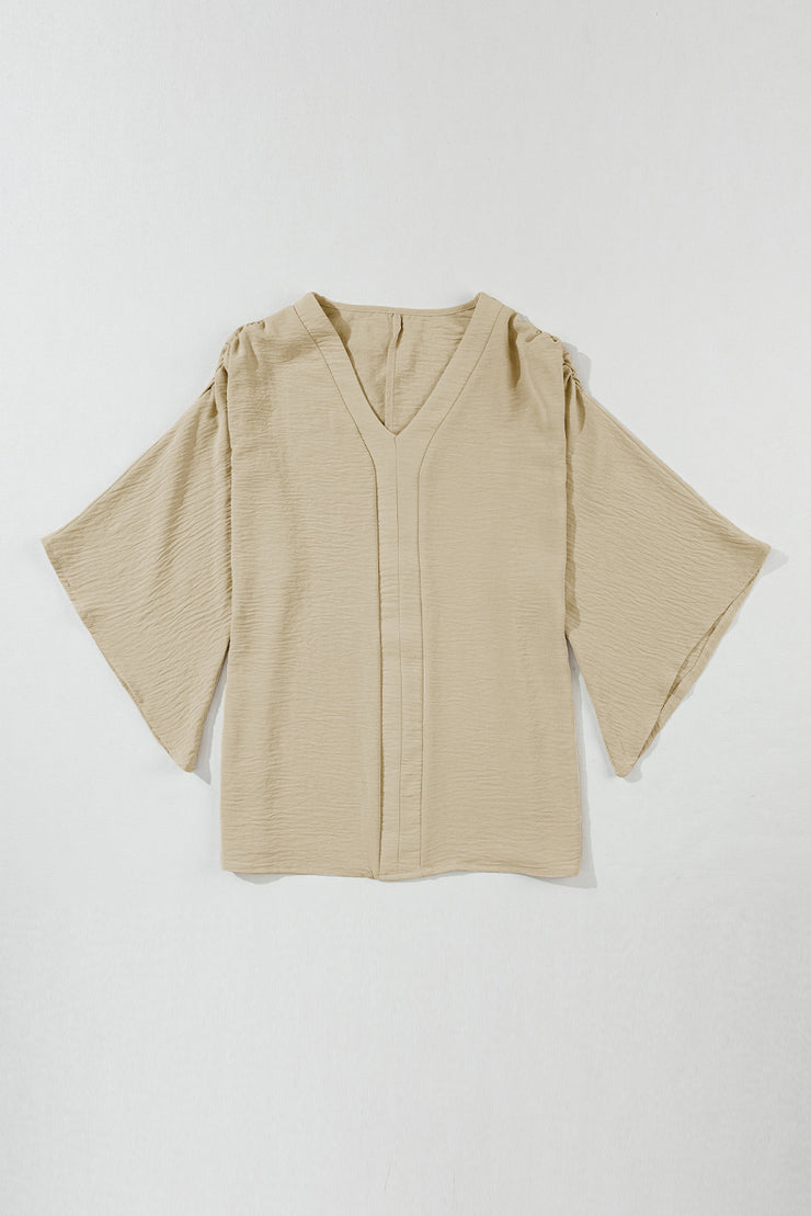 Parchment Solid V Neck Wide Sleeve Crinkled Blouse