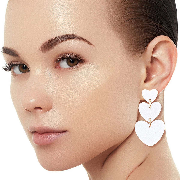 White Graduated Triple Earrings