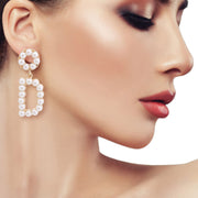 Cream Dangling D Earrings